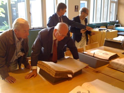 Professor Vivian Nutton and Professor Omer Steeno looking at a first edition of the Fabrica